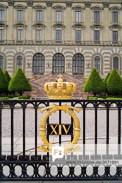 A crown on a gate in front of Stockholm Palace Stockholm Sweden.