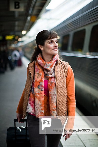 A woman at a railway station Sweden.