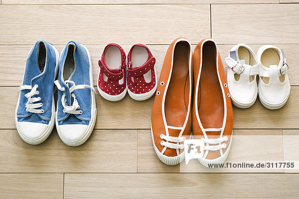 Family's shoes lined up together
