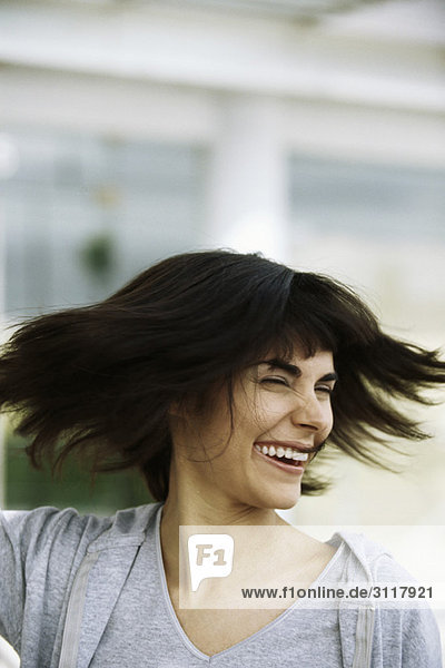 Woman tossing hair  portrait