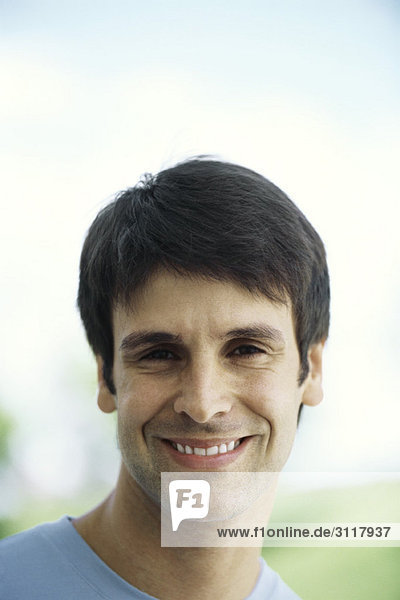 Man smiling at camera  portrait