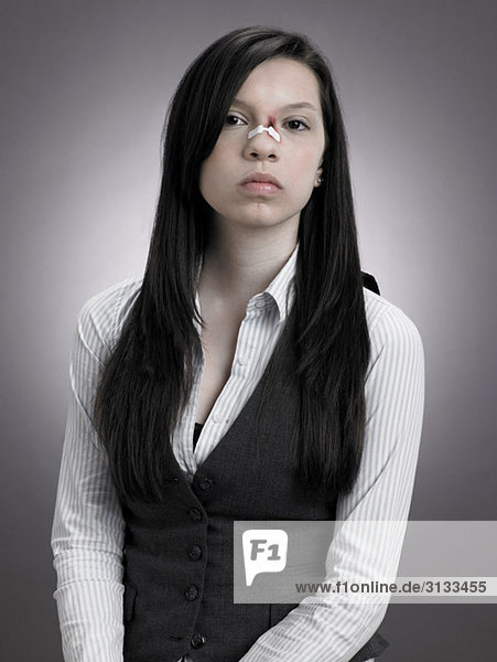 Girl with injured nose