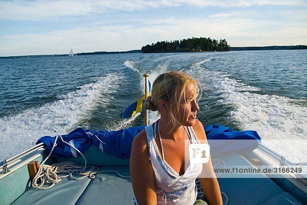 A young woman in a boat Sweden.