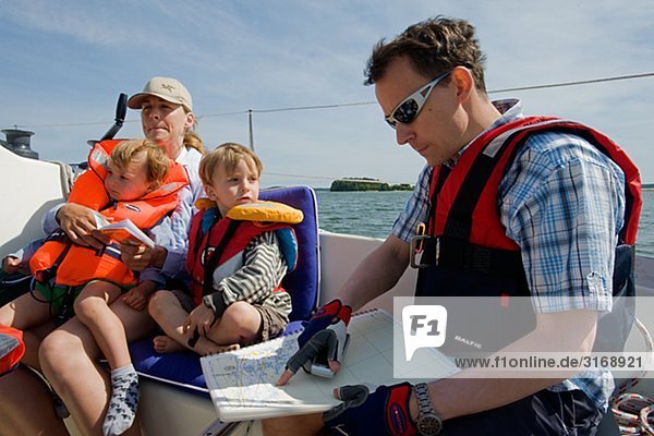 A family on a sailing-boat  Sweden.