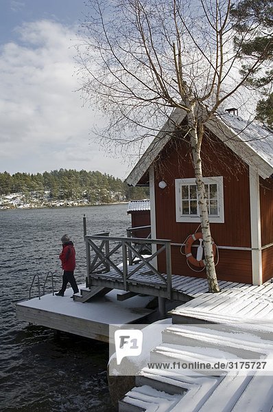 Winter Wohnhaus rot Inselgruppe Schweden