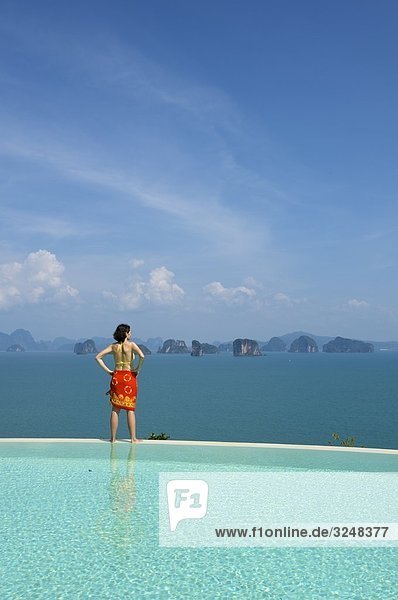 Woman standing at pool  Evason Six Senses Hideaway  Yao Noi  Thailand