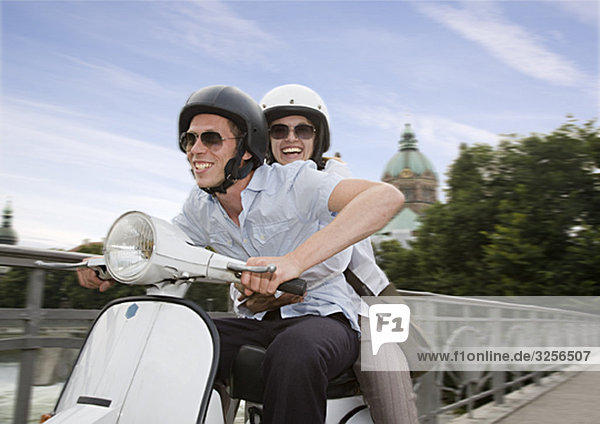 couple on scooter