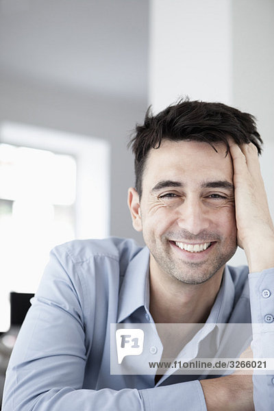 Businessman in office  smiling  portrait