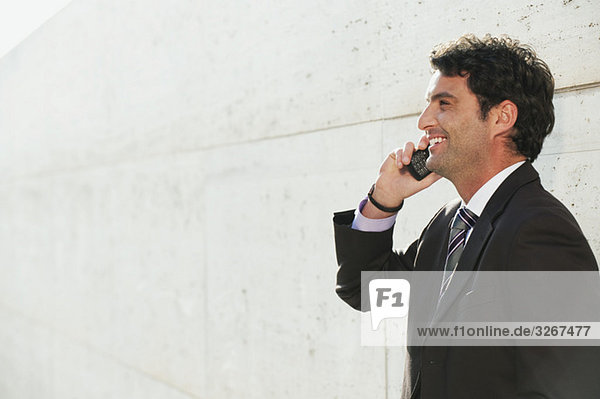 Businessman using mobile phone  portrait
