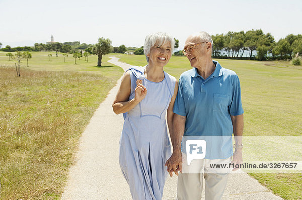 Spain  Mallorca  Senior couple having a walk  portrait