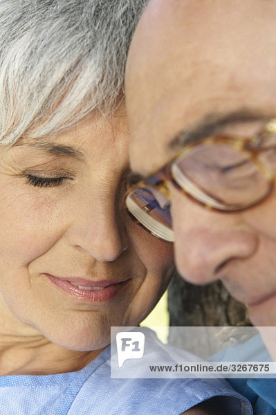 Senior couple  eyes closed  portrait  close-up