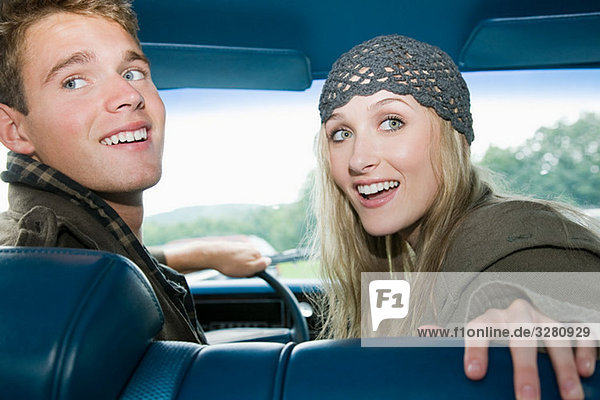 Young couple in car