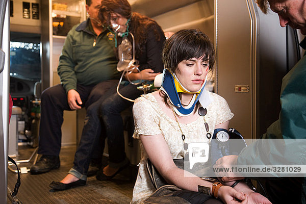 Young woman receiving medical attention