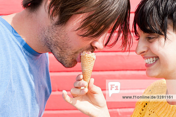 Couple sharing an ice cream