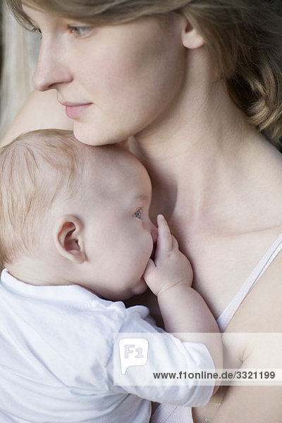 Mother and baby boy  close-up  portrait