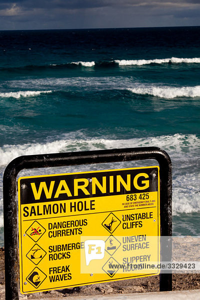 Warning sign on beach.