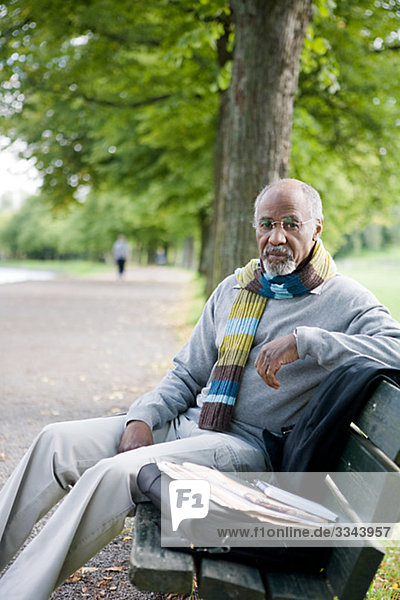 Senior man on a bench  Sweden.