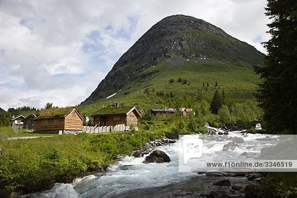 Houses by a stream Norway.