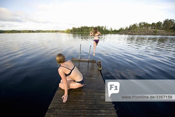 Two people on pier