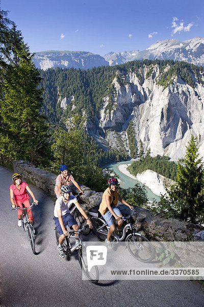 10873894  Switzerland  swiss  ride a bicycle  Rhine gulch  gulch  group  four  persons  ruin alta  gulch  canton Graubunden  Grisons  Bundnerland  Swiss Trails 2009  river  flow  scenery  Rhine  mountain bike  bicycle  bike  bicycle  summer sport  electric bicycle  electric bicycle  Flyer