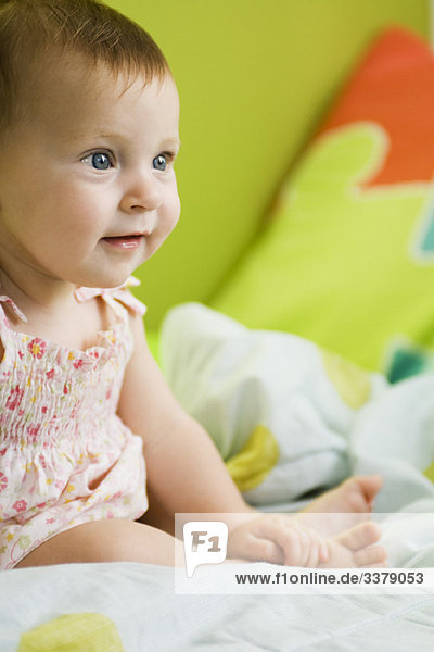 Infant girl smiling