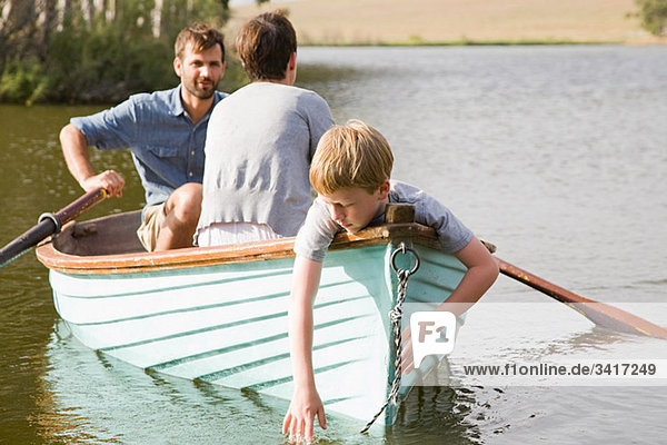 Family with rowing boat
