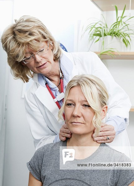 Doctor helping patient