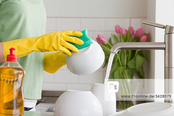 Woman washing up
