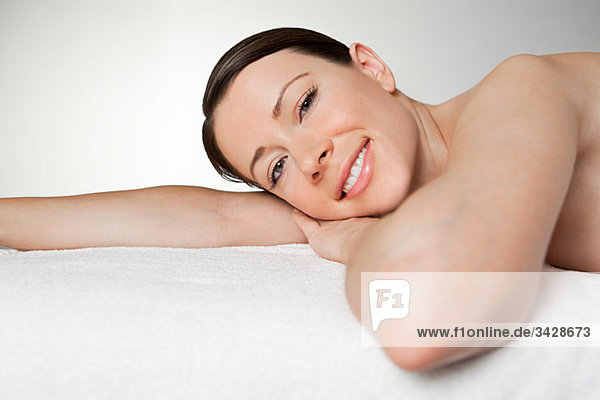 Young woman on massage table