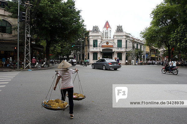 Vendor on a street in Hanoi  Vietnam