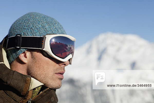 Portrait of man with ski goggles  profile