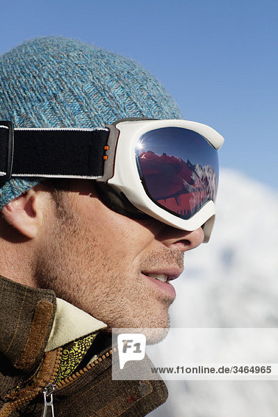 Portrait of man with ski goggles  profile