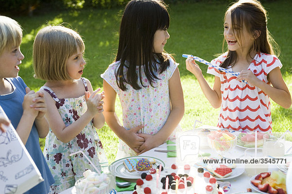 Children at outdoor birthday party