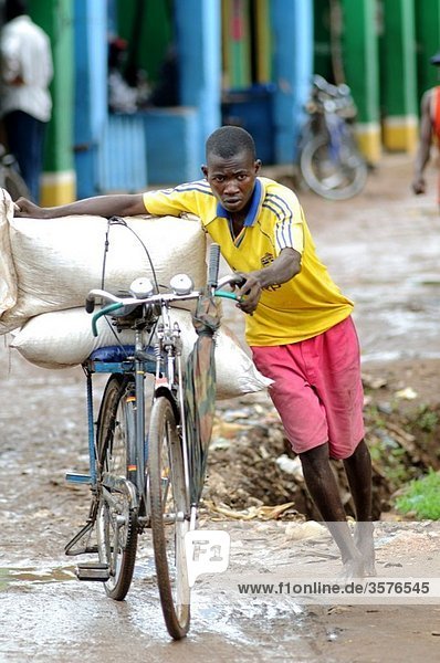 man with bicyle salima malawi