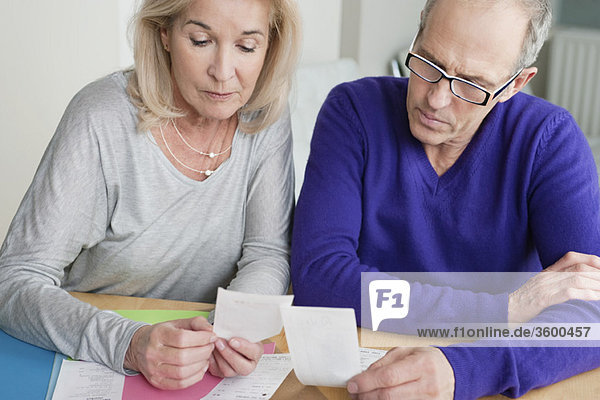 Couple sorting out bills
