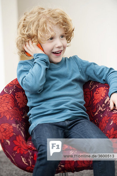 Boy talking on a mobile phone