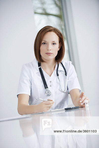 Female doctor working in an office