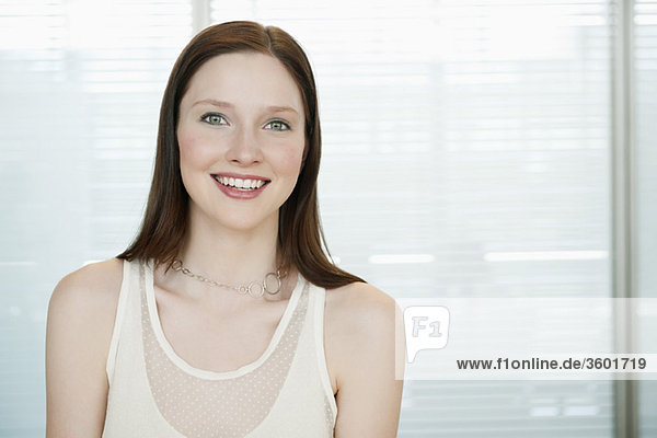 Businesswoman smiling in an office