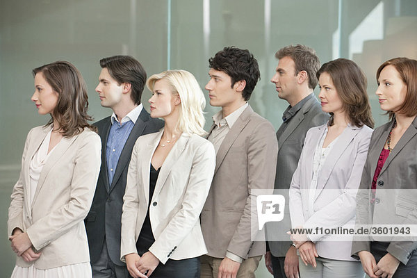 Business executives standing together