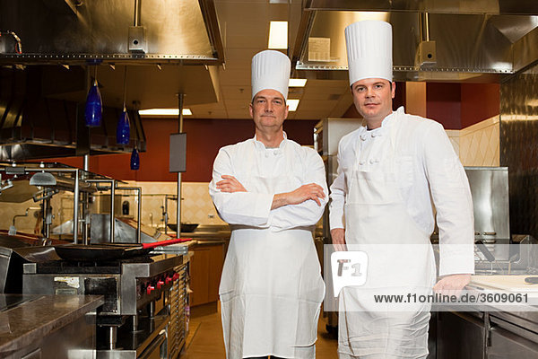 Chefs in commercial kitchen  portrait