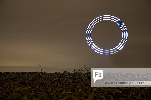 Illuminated circle at sky  Oberhausen  North Rhine-Westphalia  Germany  Europe