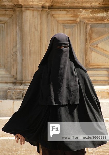 woman in a burkha in Cairo Egypt