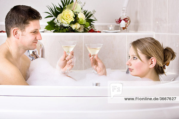 Young couple in the bathtub