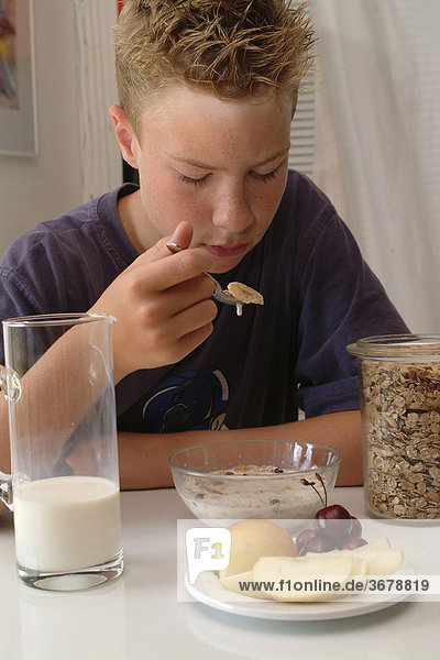 Boy eating muesli