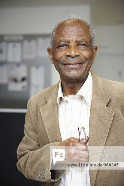 Elderly black man smiling