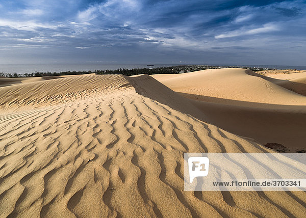 Sand dunes and structures near Mui Ne  Red Sand Dunes  Vietnam  Asia