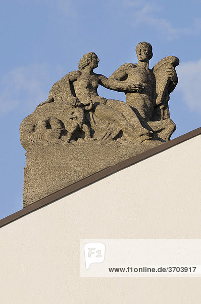 Duisburg City Theater German Opera on the Rhine the monumental statue group from tamped concrete on the left of the pediment idealism and love North Rhine-Westphalia Germany Europe