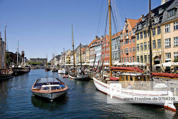 Sailing tour boat in Nyhavn Canal  Copenhagen  Denmark