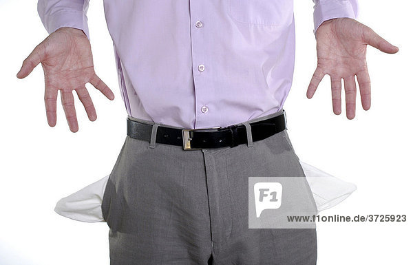 Business man with empty pockets in tough economic times  conceptual shot