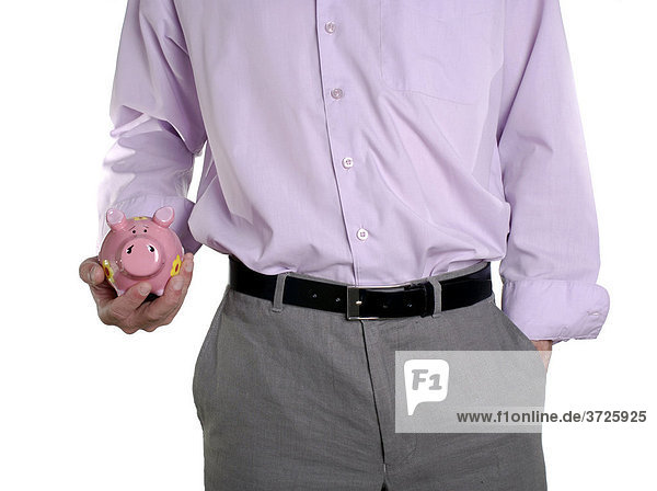 Man cradling piggy bank in his hand  conceptual shot